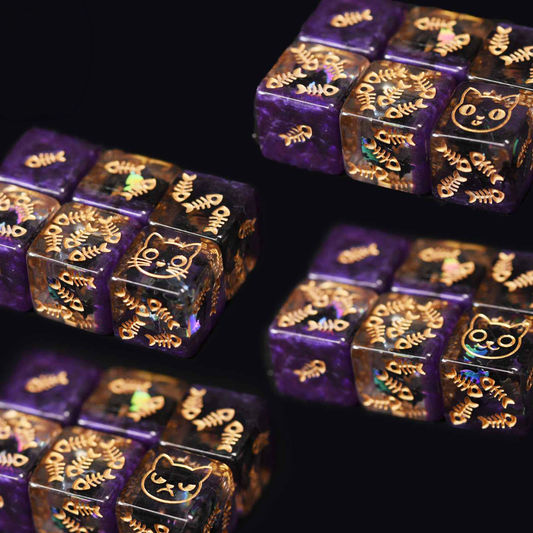 Purple dice with gold text and designs on a black background