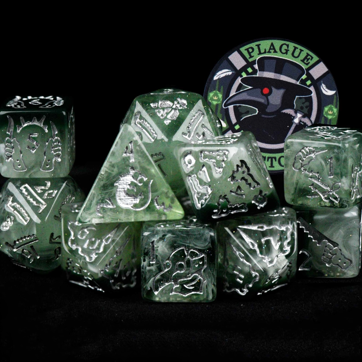 Set of green dice with intricate designs on a black background, featuring a 'Plague' logo.