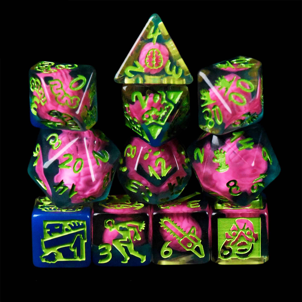 Set of colorful dice with pink and green numbers on a black background